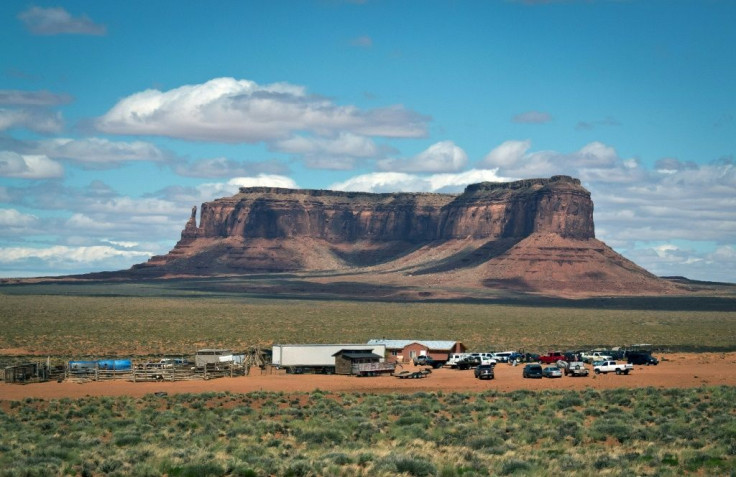 A Navajo farm is seen next to a rock formation in Monument Valley Navajo Tribal park, Utah, in 2014