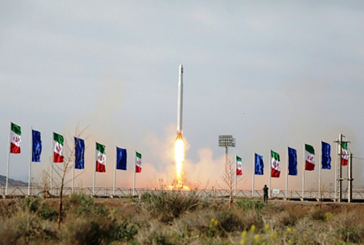 Iran's Revolutionary Guard Corps (IRGC) shows what it says was an Iranian military satellite -- dubbed the Nour -- launched from the Markazi desert in central Iran