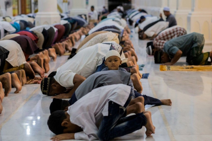 Muslim devotees offer prayers on the first night of Ramadan, in Bireuen of Aceh province, Indonesia