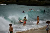 Authorities in Sydney have reopened some beaches for walking, running, swimming and surfing