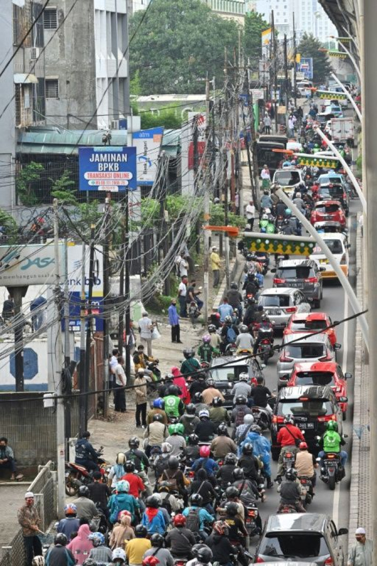 Traffic jam is seen despite the government imposing large-scale social restrictions to curb the spread of the COVID-19 coronavirus in Jakarta