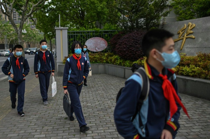 Shanghai students in their final year of middle and high school returned to classrooms