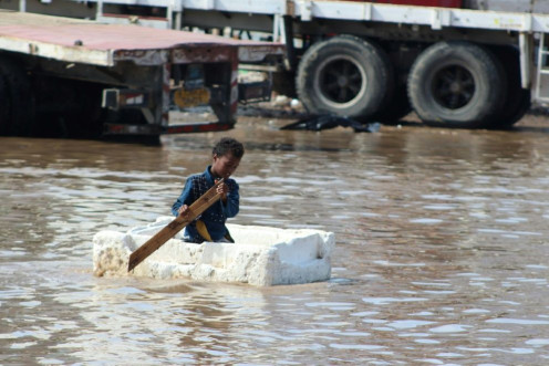A Yemeni child in a flooded street in the southern city of Aden last week