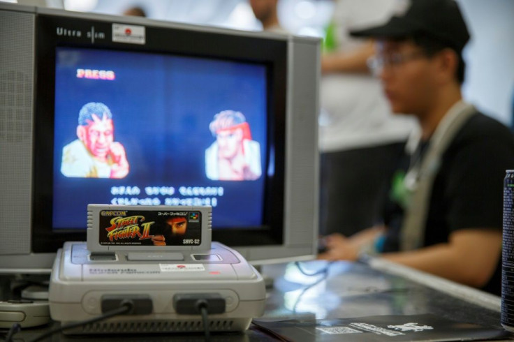 A group of Japanese retro gaming fans is offering 100 Super Nintendo consoles, similar to the one pictured here, to cooped-up kids