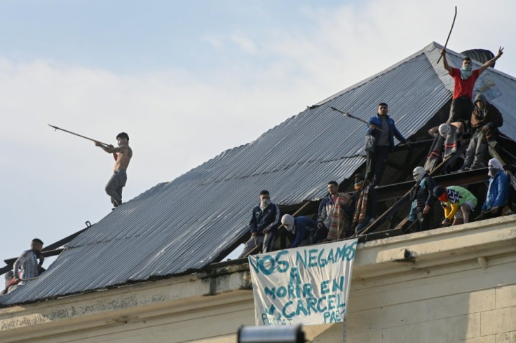 Inmates from Villa Devoto prison take part in a riot demanding measures to prevent the spread of the Covid-19 coronavirus, after a case was reported inside the detention center, in Buenos Aires