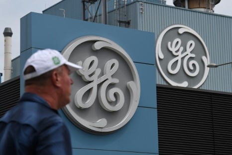General Electric reported higher first-quarter profits on a gain from a divestiture, but warned that the current quarter would see a bigger hit from the coronavirus