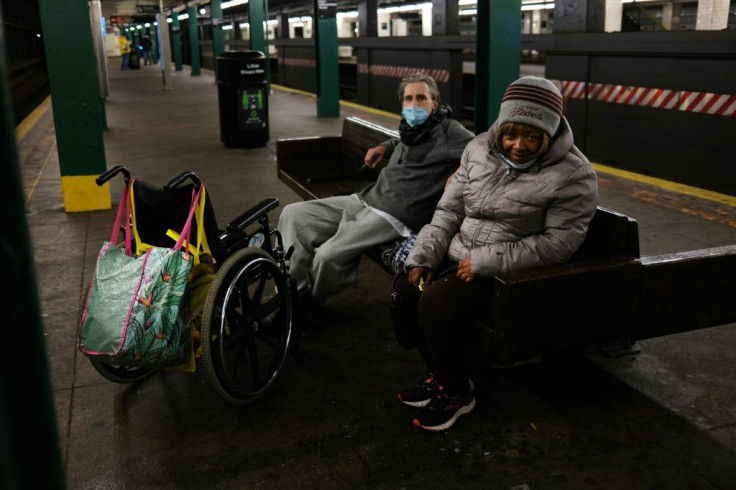 Homeless people take shelter at a New York subway station on April 13