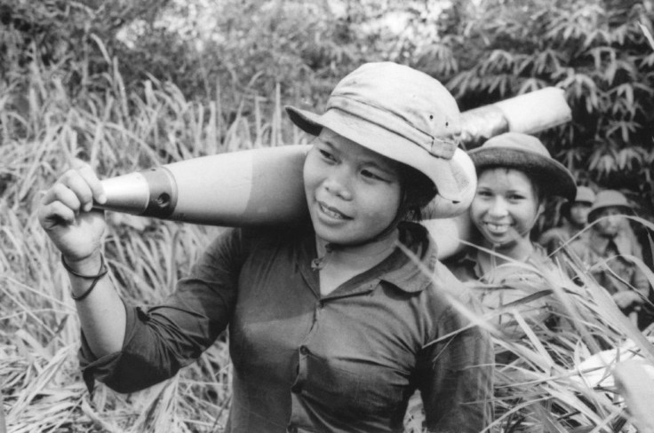 Picture released 10 June 1972 by North Vietnamese official agency with a caption saying: "Young women carry the ammunition to the front in Quang Tri province, south Vietnam"