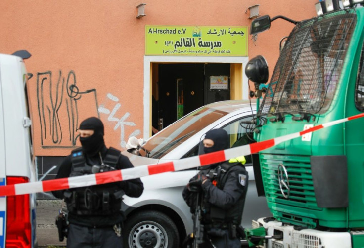 Interior Minister Horst Seehofer banned all activities of Lebanon's Iran-backed Hezbollah movement in Germany, with police raiding on mosques and other places in Berlin and other cities.