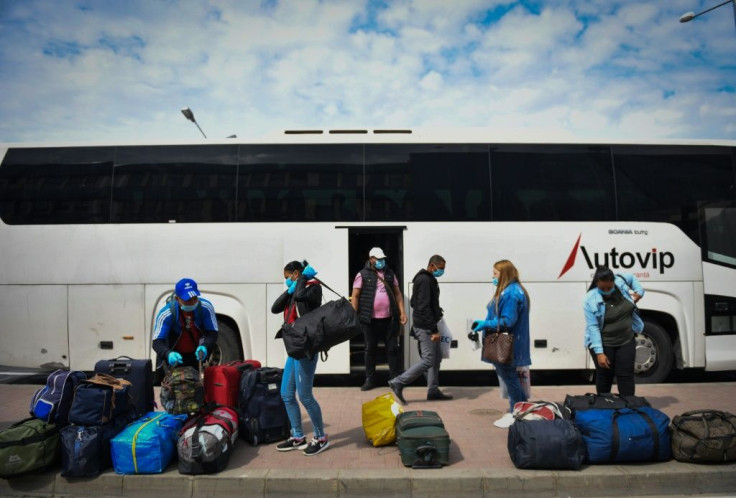 Since early April, tens of thousands have taken charter flights -- organised by agents and approved by the government -- to Germany and the United Kingdom to help harvest asparagus and fruit