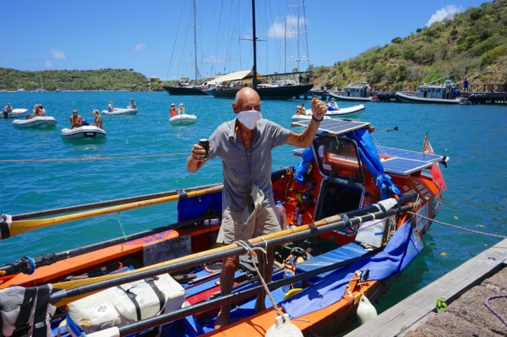 British solo rower Graham Walters, 72 arrives in Antigua on April 29, 2020 after nine weeks of rowing across the Atlantic