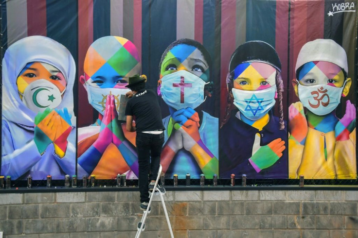 Brazilian muralist Kobra's most recent work "Coexistence" represents five children from five of the world's major religions