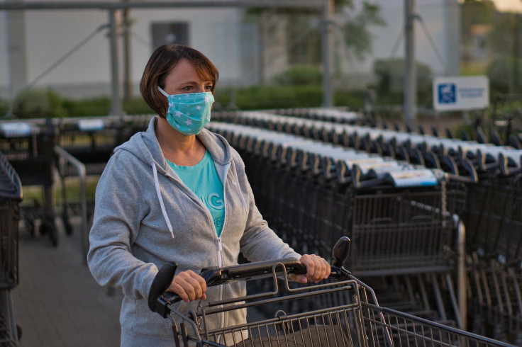 coronavirus effect supermarket use plastic tents to protect cashiers at checkout