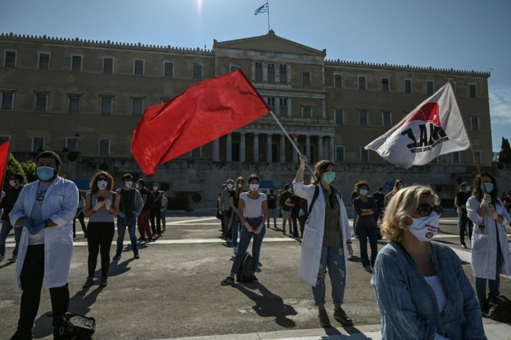 Demonstraters in Athens marked May Day while wearing protective masks and respecting social distancing