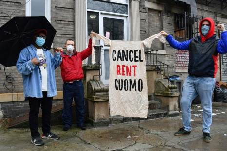 Crown Heights building tenants Jose Sanchez, Sean Reilly and Stephen Henderson participated in a May Day rent strike urging housing payment freezes for the duration of the coronavirus pandemic