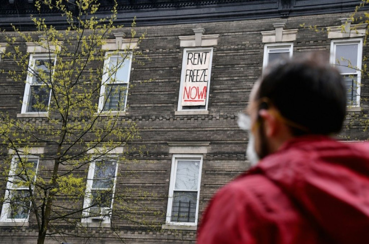 As Sean Reilly and fellow tenants unfurled banners at their walk-up in the Crown Heights neighborhood, cars surrounded the governor's mansion in New York's state capital Albany for a socially distanced protest