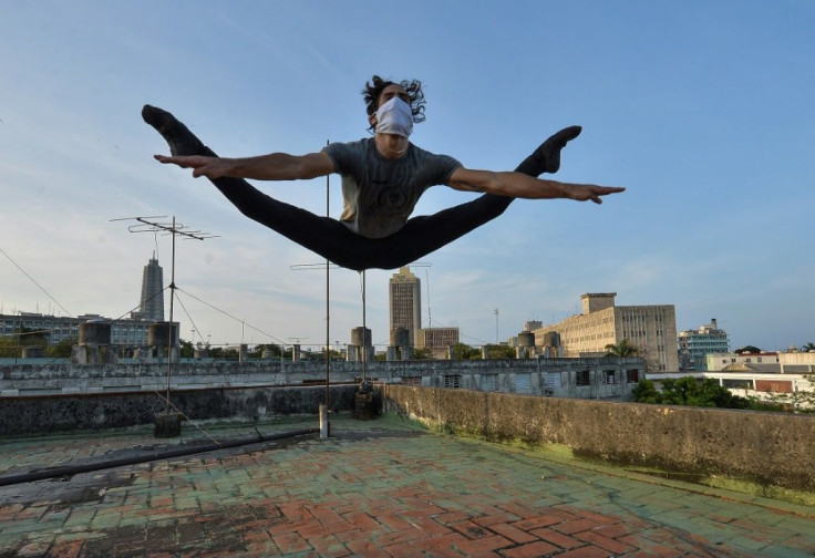 Cuban ballet dancer Adrian Sanchez keeps in shape on a Havana rooftop as he awaits the end of the coronavirus pandemic