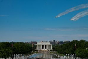 The US Navy Blue Angels and US Air Force Thunderbirds fly over the Lincoln Memorial on May 2, 2020