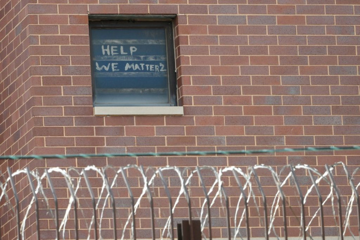 "Help we matter 2" written in a window at the Chicago Cook County Department of Corrections, housing one of largest US jails, amid a coronavirus outbreak among inmates and staff