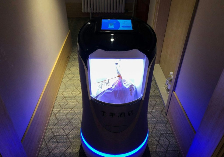 This robot is capable of taking elevators and navigating hallways to deliver food to hotel guests