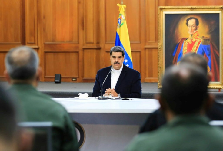 President Nicolas Maduro, shown in a handout picture released by the Venezuelan Presidency speaking to members of the Bolivarian National Armed Forces (FANB), announced that two Americans were arrested for taking part in the failed "invasion"