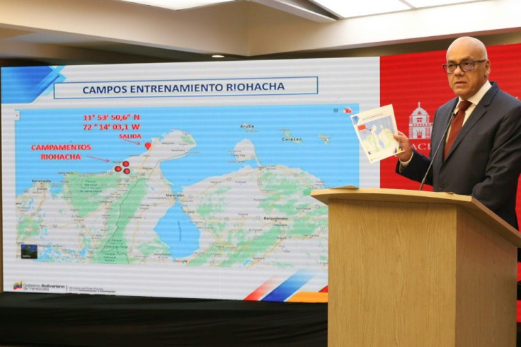 Venezuelan Information Minister Jorge Rodriguez makes an announcement at the Miraflores Presidential Palace