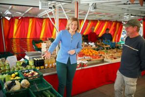 Data by the AMI consultancy shows German fresh food prices were up 10 percent on-year in April -- here Agriculture Minister Julia Kloeckner visits a weekly market near Berlin