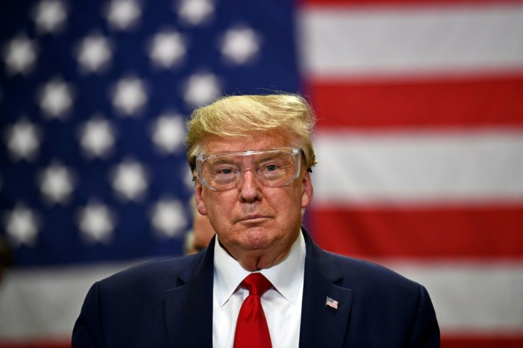 US President Donald Trump tours a Honeywell International plant that manufactures personal protective equipment in Phoenix, Arizona