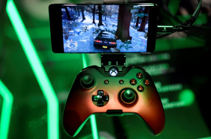 In this file photo taken on August 21, 2019 a cloud-based console is displayed at the Microsoft Xbox stand during the Video games trade fair Gamescom in Cologne, western Germany
