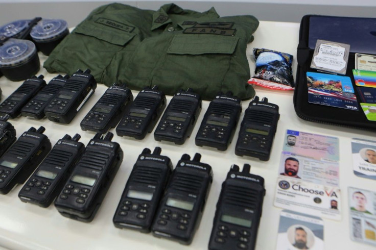 The Venezuelan president released photos showing two-way radios, ID cards and other military gear allegedly seized from the two US suspects