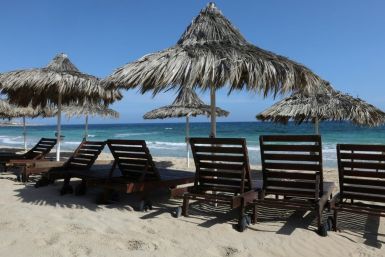 Empty sunbeds in the Cypriot resort town of Ayia Napa, where residents were permitted to swim again from Monday, but not to lounge on the beach