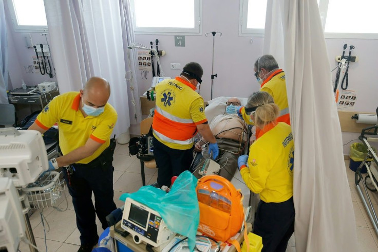 Healthcare workers help a patient in Sant Felix healthcare centre in Sabadell