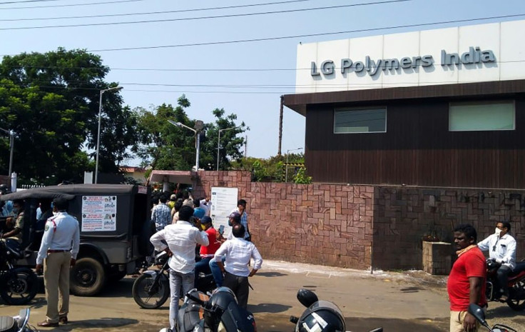 Policemen stand guard outside the LG Polymers plant in eastern India following a deadly gas leak