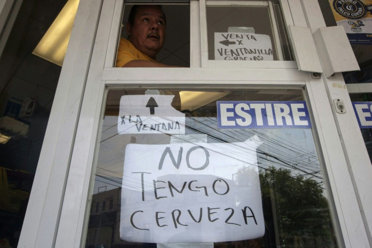 A sign on a store in Monterrey, Mexico reads "I don't have beer" amid a nationwide shortage
