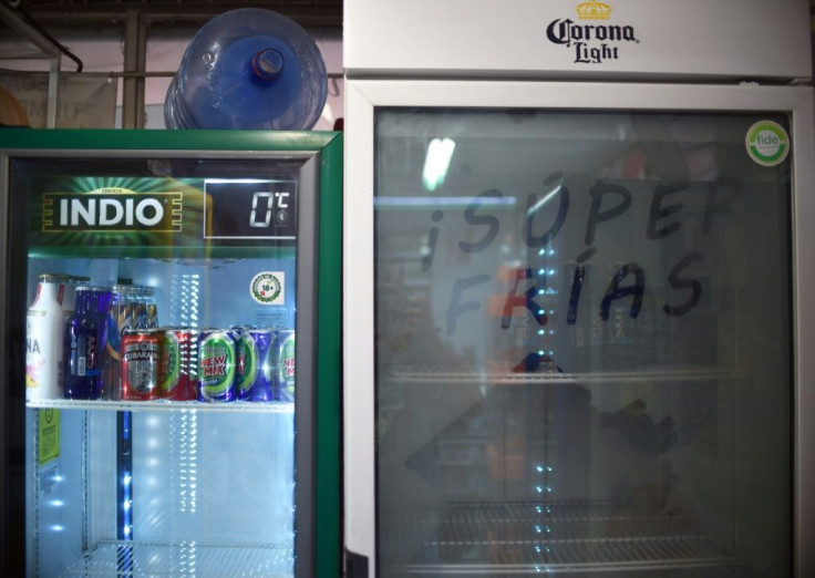 Store refrigerators, such as this one in Mexico City on May 5, are empty with beer-making deemed a non-essential activity during the coronavirus pandemic