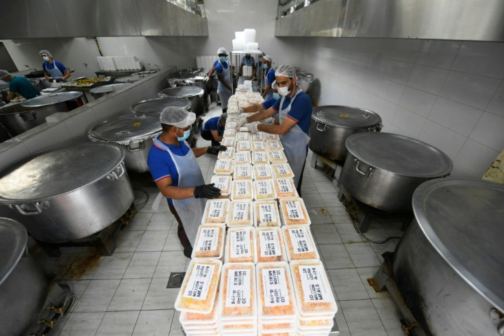 Many of the millions of migrant workers in the Gulf have been left unemployed and unpaid, and dependent on free handouts like these iftar meals being prepared for distribution on the initiative of Dubai ruler Sheikh Mohammed bin Rashid al-Maktoum