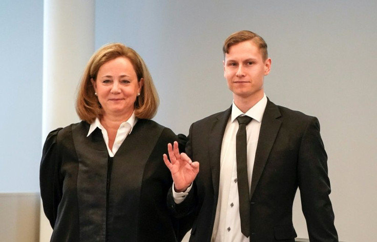 Norwegian Philip Manshaus (right), with his lawyer (left) pleaded not guilty to opening fire at a mosque near Oslo last year