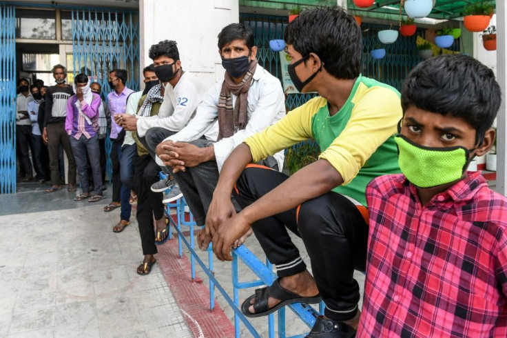 Migrant labourers like these men in India are particularly vulnerable during the virus lockdown