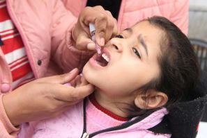 Health workers administer polio drops to a child in the Indian city of Amritsar in January 2020