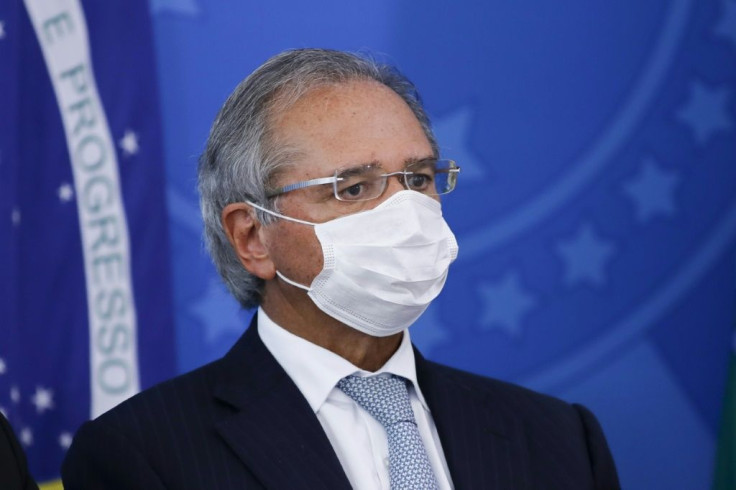 Brazil's Economy Minister Paulo Guedes -- seen here in March 2020 -- has warned of a possible "economic collapse" because of stay-at-home measures designed to curb the spread of the novel coronavirus