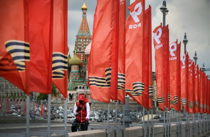 The Victory Day banners are out across Moscow but the traditional military parade will not take place on Saturday
