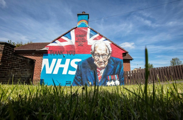 An east Belfast mural shows the logo of the National Health Service and an image of 100-year-old British army veteran Captain Tom Moore who raised over 30 million pounds for NHS charities