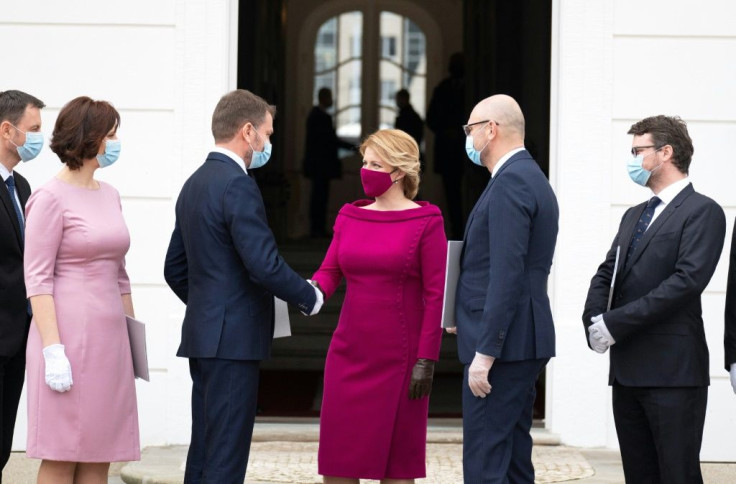 Slovakia's President Zuzana Caputova, centre, with members of her country's new government in March.