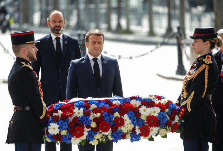 French President Emmanuel Macron and Prime Minister Edouard Philippe attended a small ceremony at the Arc de Triomphe in Paris