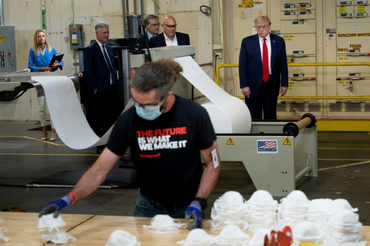 US President Donald Trump toured a Honeywell mask production line but did not wear one in public