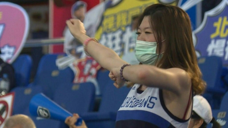 Taiwanese baseball fans cheer their teams at live stadium games, after the island kept coronavirus infections down and its professional sports leagues running despite the pandemic.