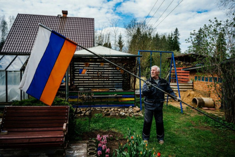 Despite the coronavirus putting limitations on official celebrations, Gennadiy Matveyev kept up his long tradition of raising the Russian flag to commemorate  victory over Nazi Germany