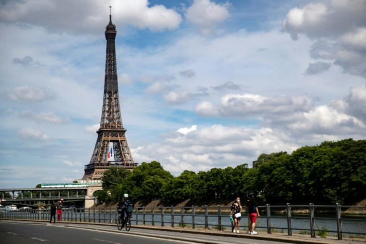 Hoping the worst may be over as the partial relaxation of lockdown looms, these Parisiens enjoyed a weekend stroll by the River Seine