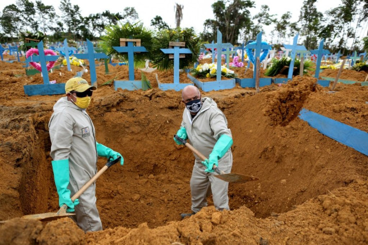 Workers dig graves at Nossa Senhora Cemetery in Manaus, Brazil on May 8 amid the coronavirus pandemic