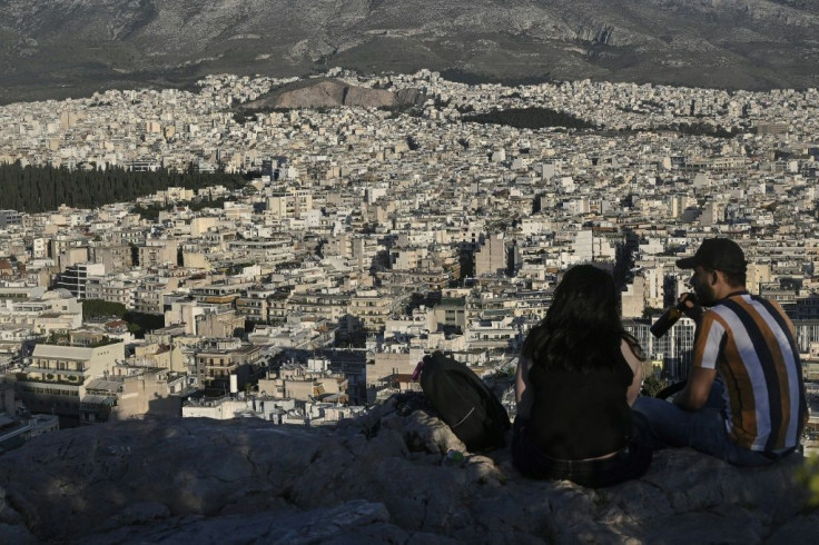 Owners of small apartments in the tourist Koukaki district of Athens, who had been renting them on Airbnb to provide income during the financial crisis, are once again struggling